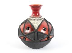 A 20th century African studio pottery globular vase.