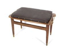 A 1960s upholstered teak stool.