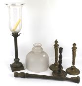 An assortment of lamp bases, shades and candlesticks.
