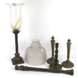 An assortment of lamp bases, shades and candlesticks.