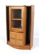 A Nathan glazed display cabinet and CD rack.
