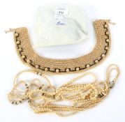 Four artificial pearl necklaces and a vintage beaded dress collar.