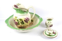 An early 20th century four piece Staffordshire pottery washing set.