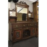 An Edwardian mirror back mahogany sideboard.