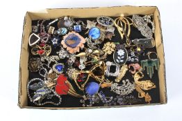 An assortment of vintage and later costume jewellery.