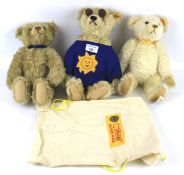 Three modern Stieff teddy bears. Including one wearing sunglasses,