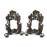 A pair of cast metal bronze effect photo frames.