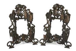 A pair of cast metal bronze effect photo frames.