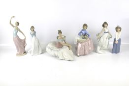 A collection of six assorted Nao china figures of woman.