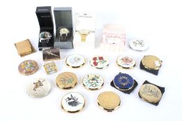 An assortment of contemporary compacts and three boxed gentleman's' watches.