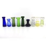 Nine assorted vintage glass bulb vases.