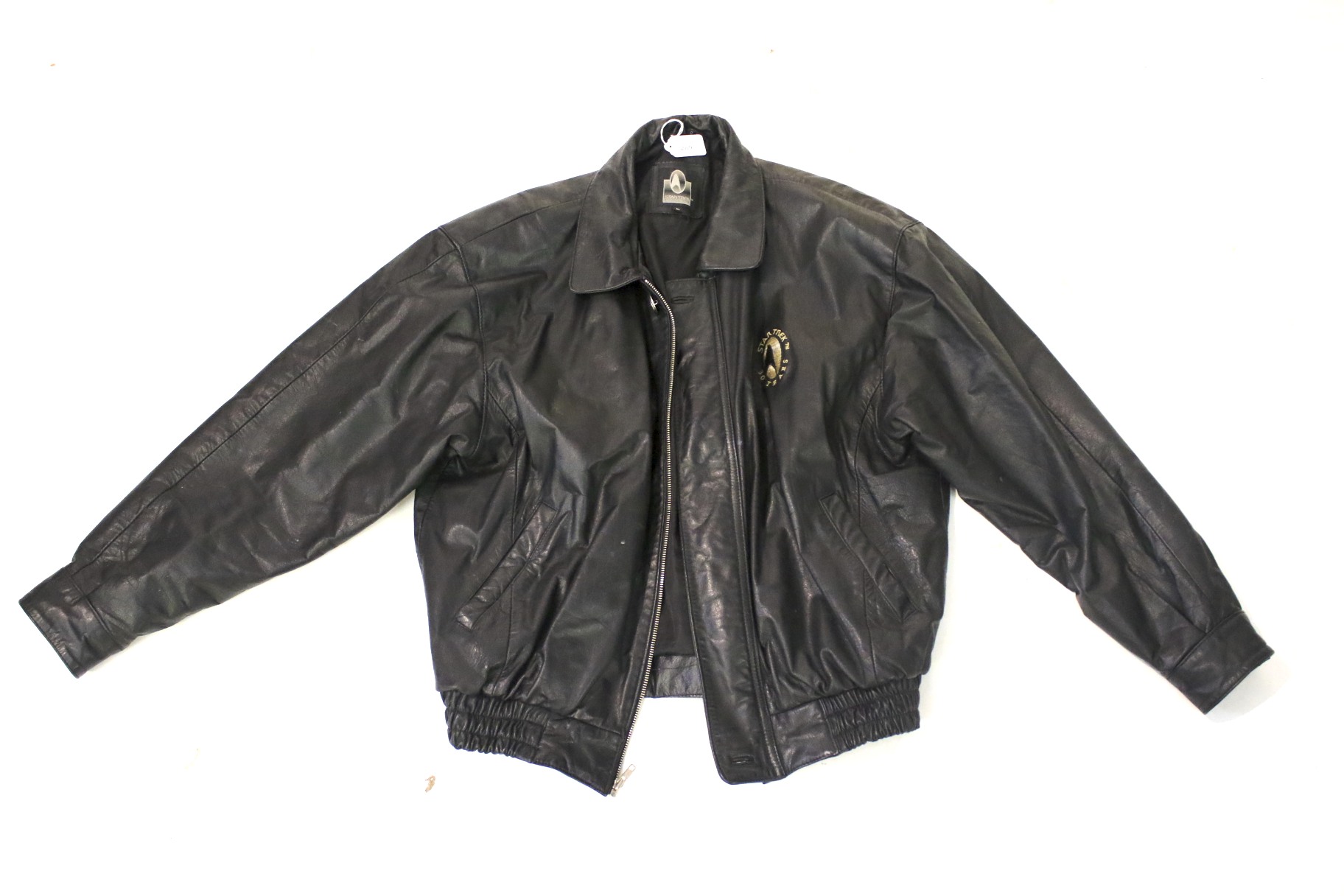 A men's Star Trek 30th anniversary black leather jacket.