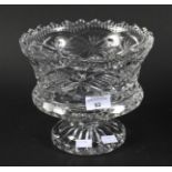 A large crystal cut glass fruit bowl.