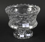 A large crystal cut glass fruit bowl.