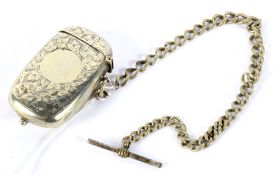 A Victorian white metal sovereign case, vesta and Albert chain.