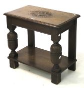 A Jacobean style oak hall table with single drawer.