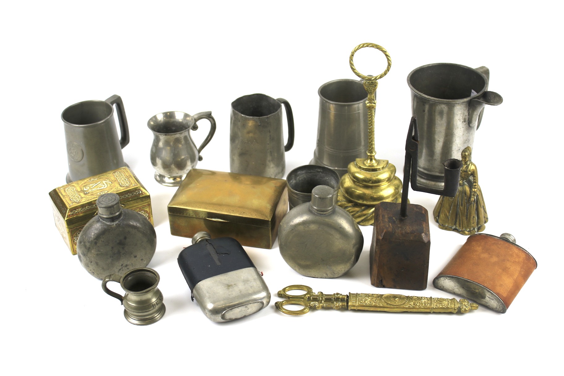 A collection of assorted 19th century metalware including pewter tankards.