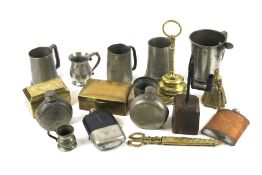 A collection of assorted 19th century metalware including pewter tankards.