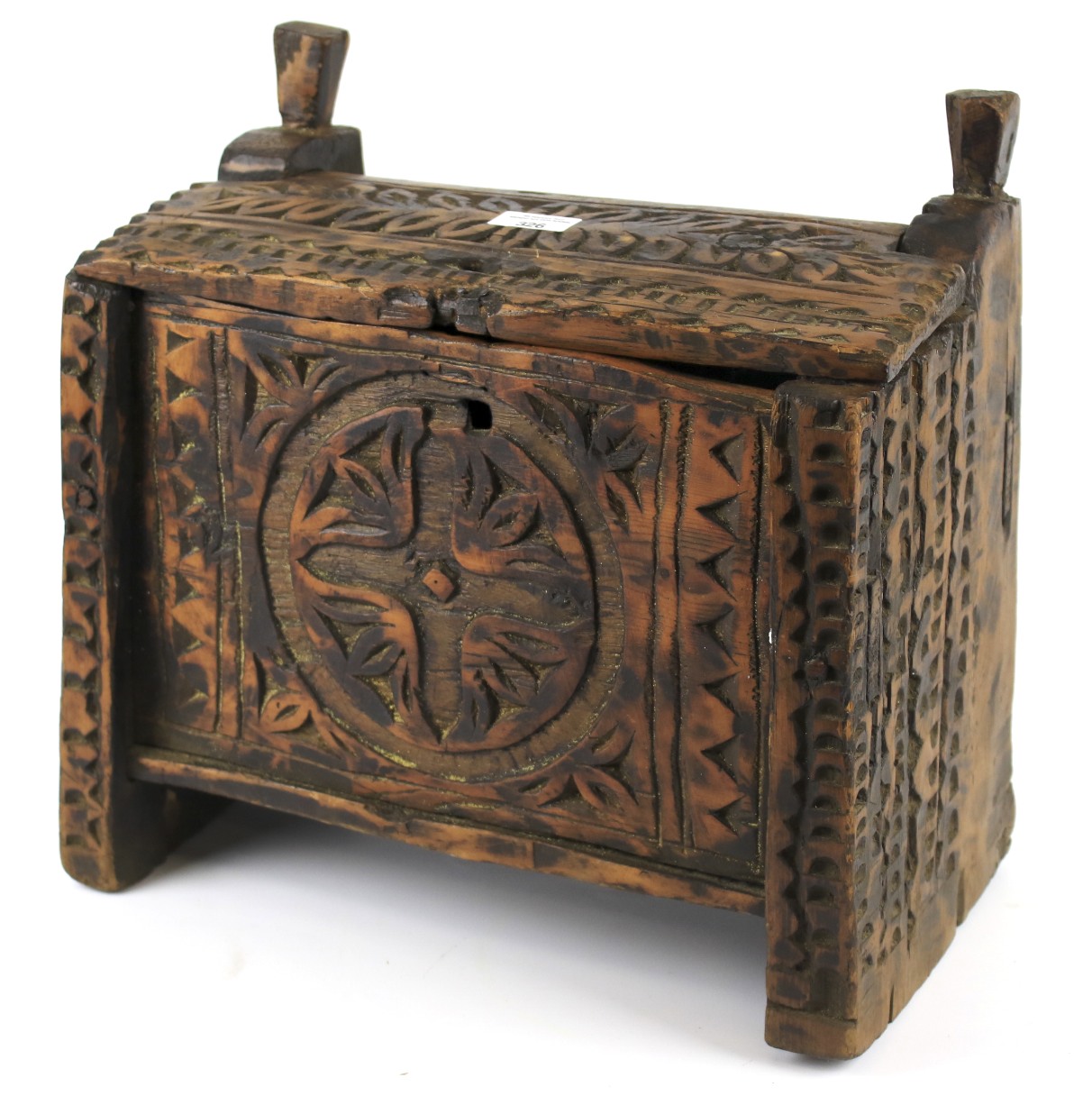 A 20th century folk art style carved and notch cut wooden box and cover.