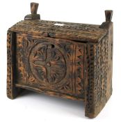 A 20th century folk art style carved and notch cut wooden box and cover.