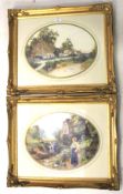 A pair of contemporary molded gilt framed prints.