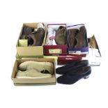 Nine pairs of assorted women's shoes.
