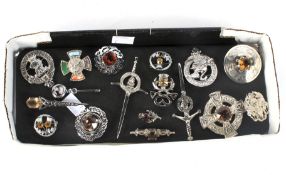 An assortment of vintage and later Scottish costume jewellery.