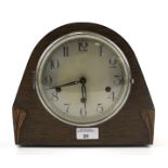 A 20th century oak cased mantel clock.