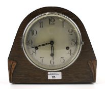 A 20th century oak cased mantel clock.