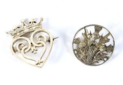 Two Iona silver brooches by John Hart.