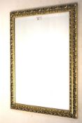 A contemporary pierced giltwood mirror of rectangular form. With acanthus moulded frame,