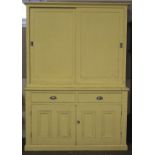 A 19th century yellow painted pine kitchen dresser.