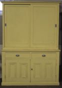 A 19th century yellow painted pine kitchen dresser.