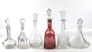 Six assorted 19th and 20th century glass decanters with stoppers.