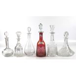 Six assorted 19th and 20th century glass decanters with stoppers.