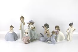 Eight assorted Nao porcelain girl figures all in original boxes.