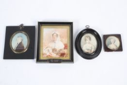 Three 19th century portrait miniatures on ivory and portrait of a girl.