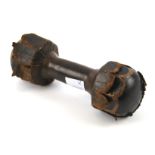 A vintage leather clad dumbbell weight.