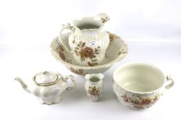 A Victorian water jug and bowl wash set with matching pot and vase.