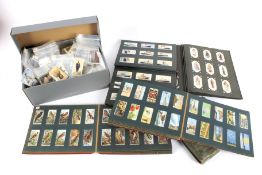 A large quantity of assorted vintage cigarette collectors cards.