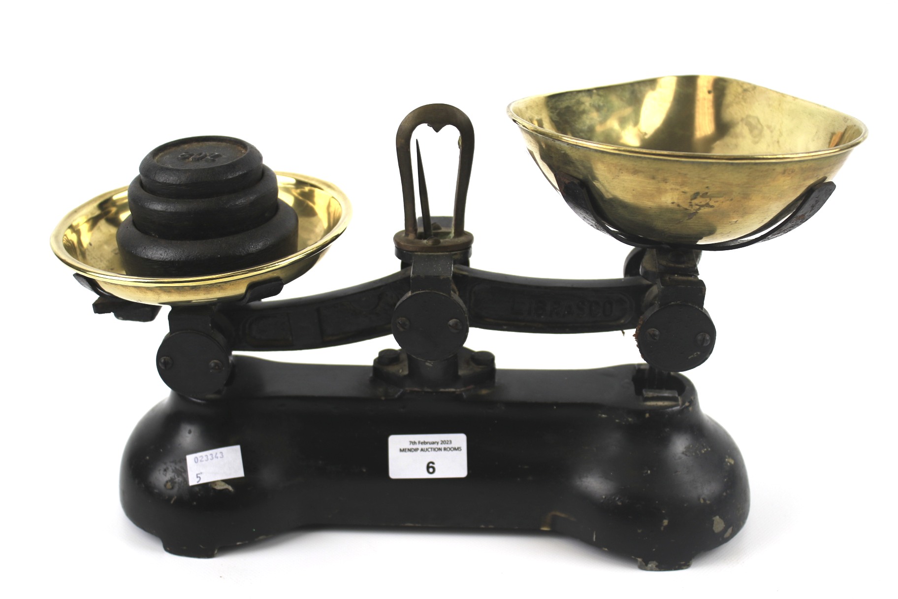 A set of Librasco pan scales and weights.
