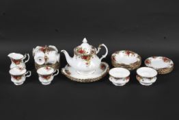 A Royal Albert six setting Country Roses pattern tea and dessert service.