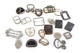 A collection of vintage belt buckles.