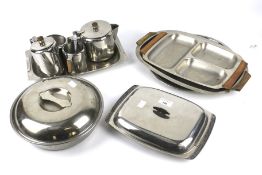 Twelve items of assorted stainless steel retro part tea and dinner service.