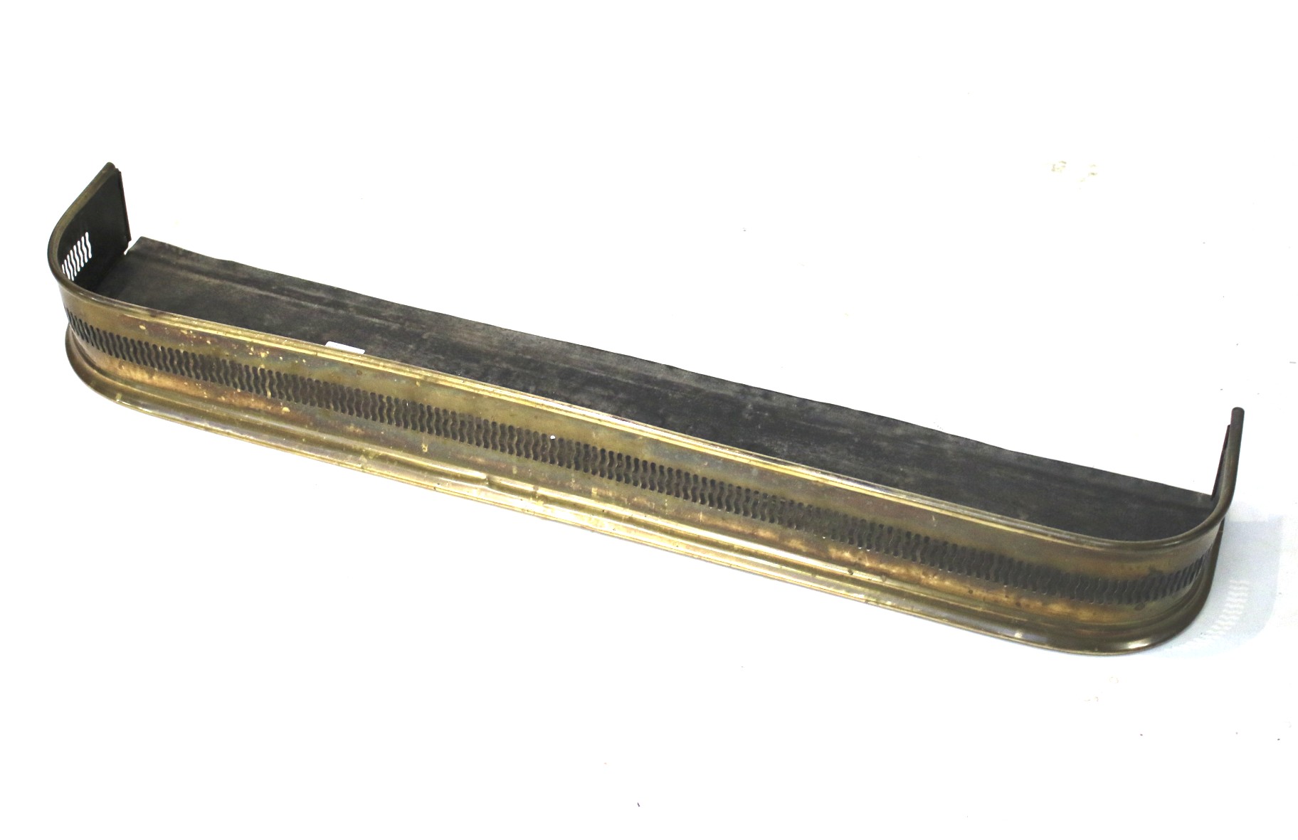 A 20th century brass fender.