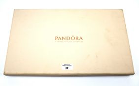 A boxed Pandora photo frame.