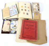 Two Victorian stamp albums and a quantity of loose stamps.