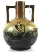 A mid-20th century Tacel Art Pottery bulbous twin-handle vase.