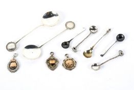 An assortment of Victorian and later silver and white metal.