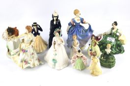 A collection of eleven assorted Royal Doulton 'Lady' figurines.